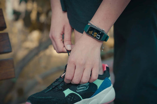 Runner tying shoe lace