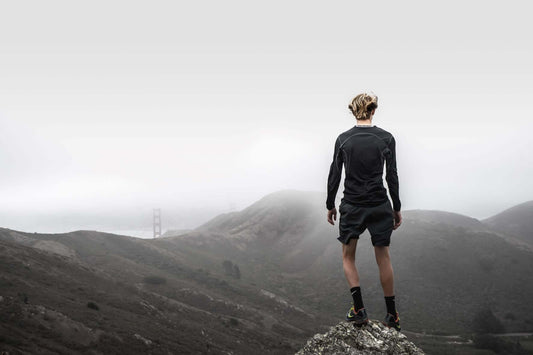 Runner jogging in the mist
