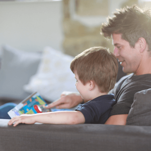 Boy and Father reading Million Mile Light Kids Book