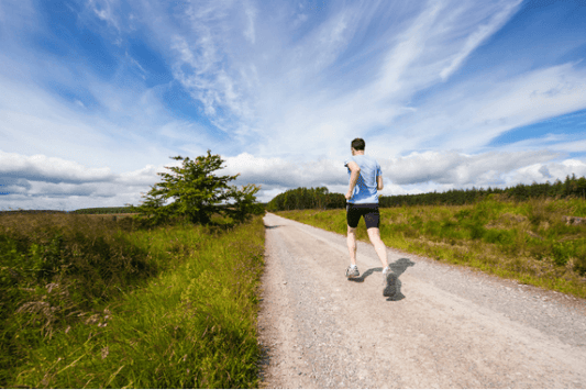 Man jogging through the countryside