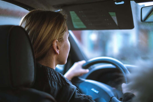 Image of woman driving car
